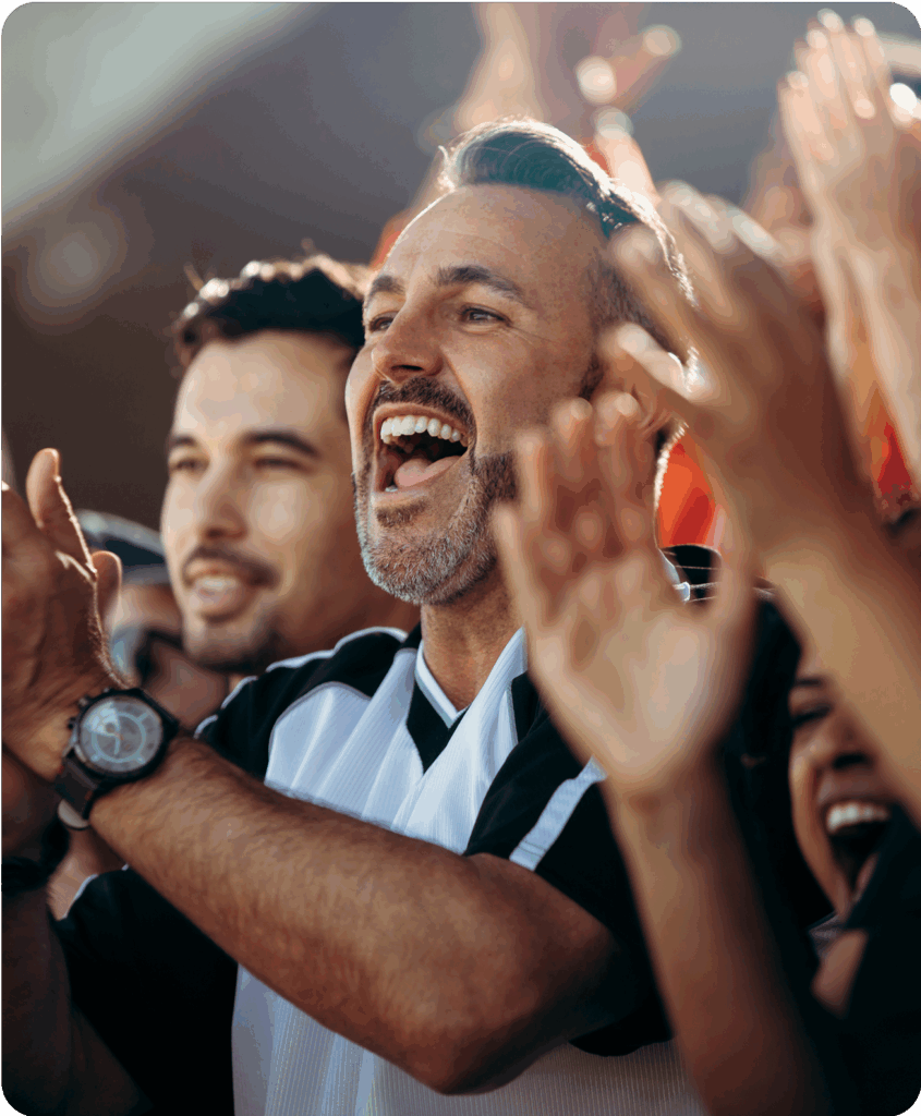 Fan cheering at a sporting event
