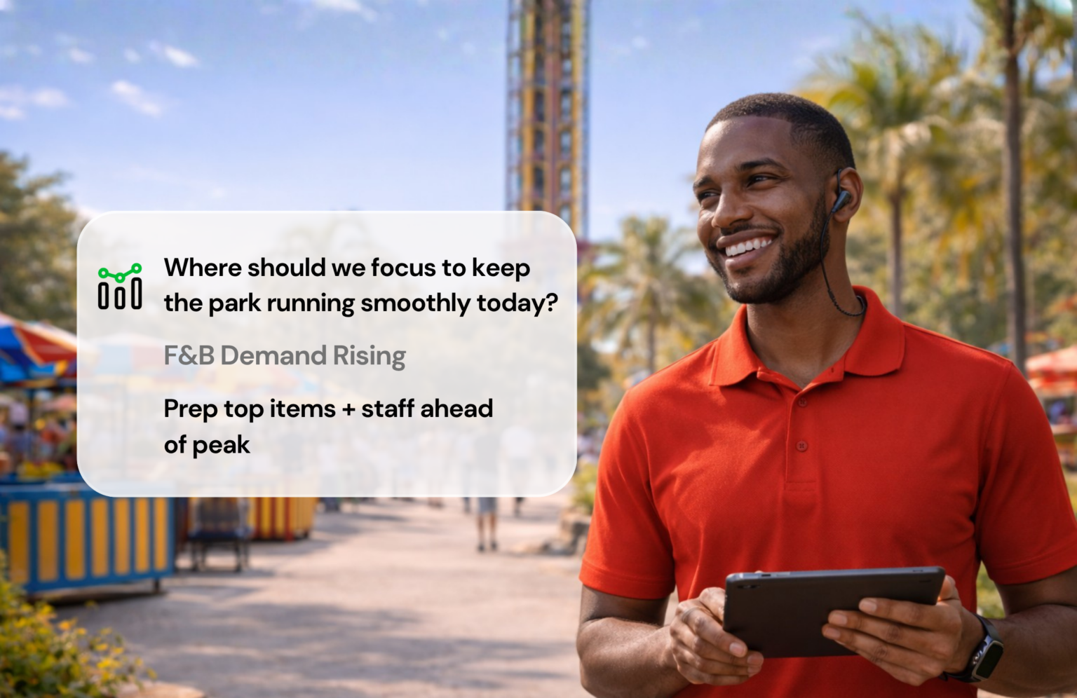 Happy theme park employee holding Ipad.