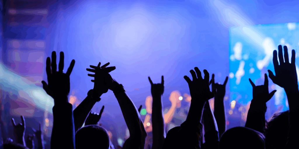 Rethinking “All-In-One”: Why Curated Technology Is the Smart Play for Ticketing Success 1 In a crowd at a concert