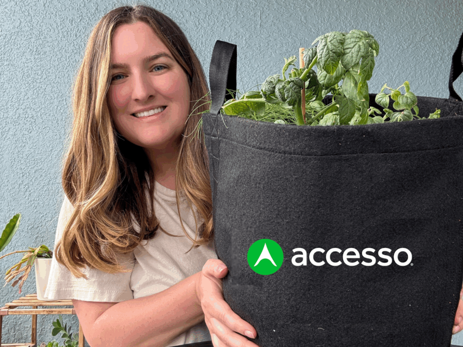 employee holding plant