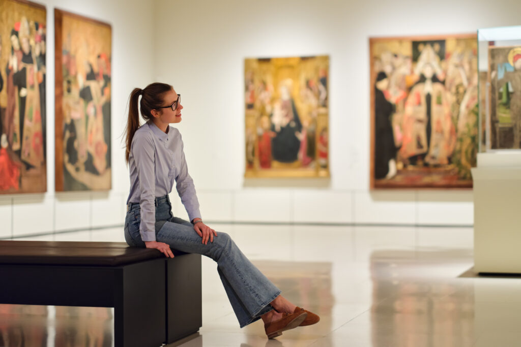 Woman sitting in an art museum